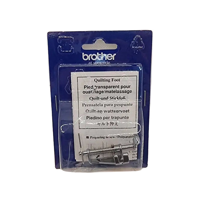 A Brother quilting foot in its original blue retail packaging, showing the metal foot through a clear plastic window with a white product label.