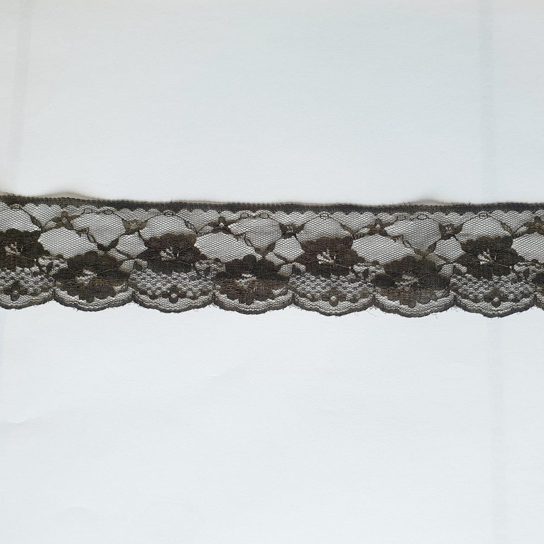 Essential Trimmings Lace Nylon Lace Trim: 70mm wide: Dark Green. Price per metre. - The Sewing Studio