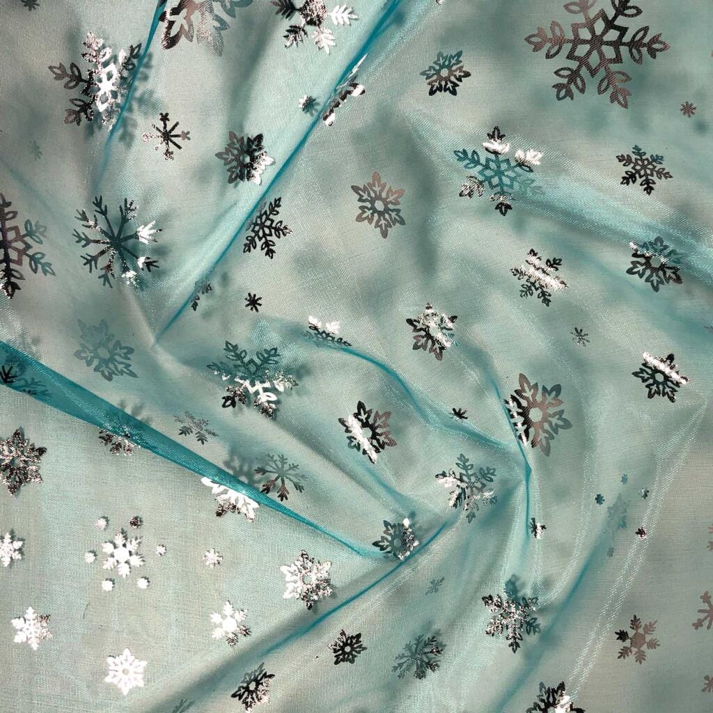 Oddies Fabric Fleece Polyester Organza Snowflake Foil Turquoise 2411 21 - The Sewing Studio