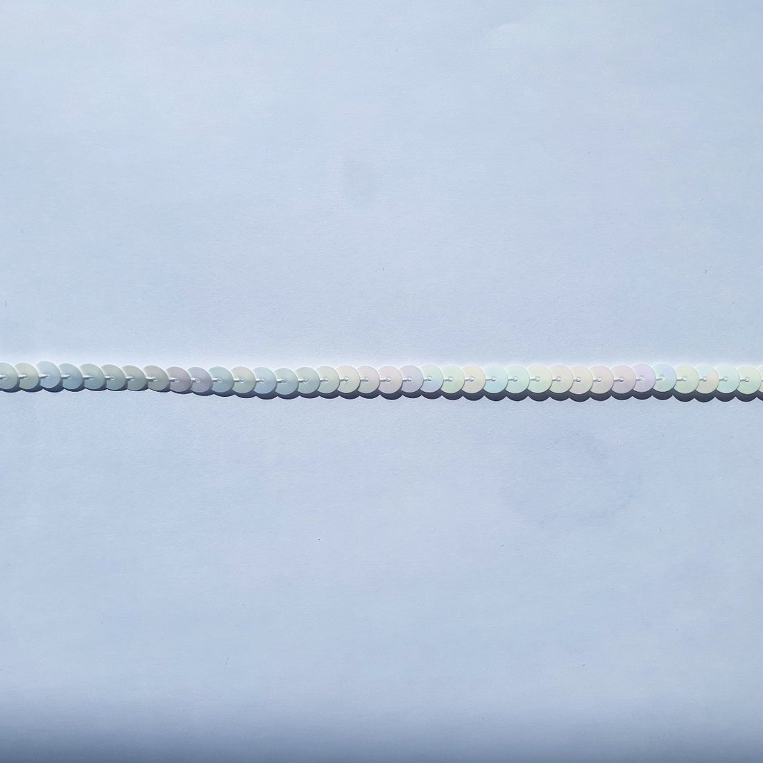 Trimits Beads Sequins Accessories Strung Sequins: 6mm wide: White. Price per metre. - The Sewing Studio
