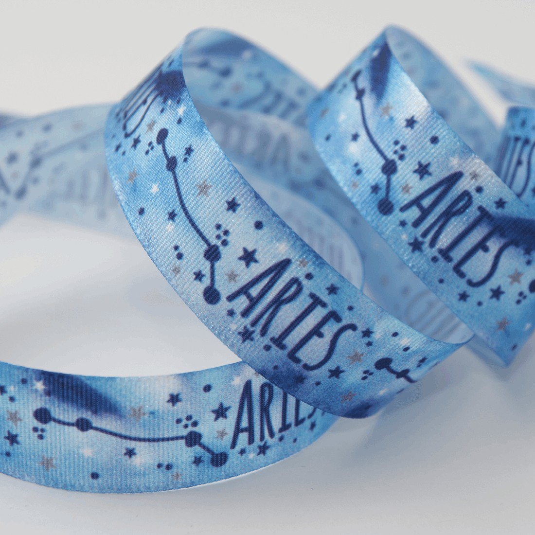 Berisfords Ribbon Zodiac Star Sign Ribbon: Aries: 15mm wide. Price per metre. - The Sewing Studio