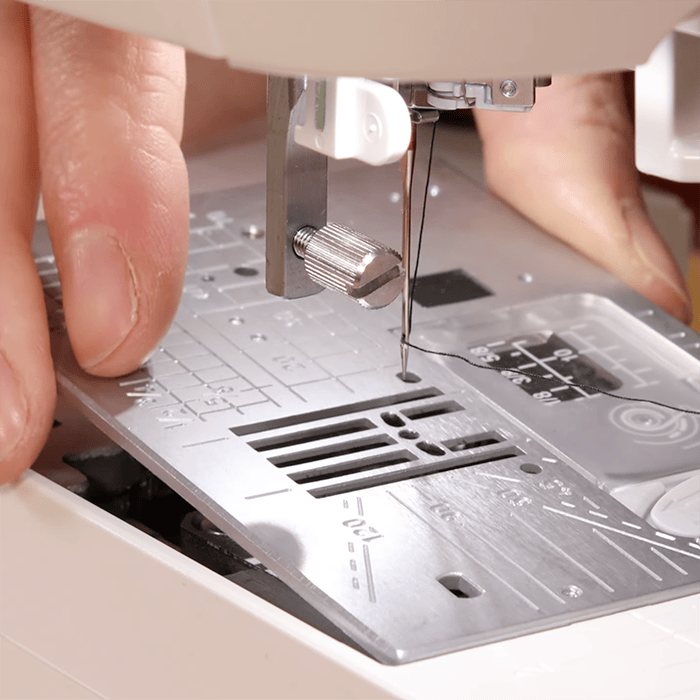 Quick-Change Needle Plate System