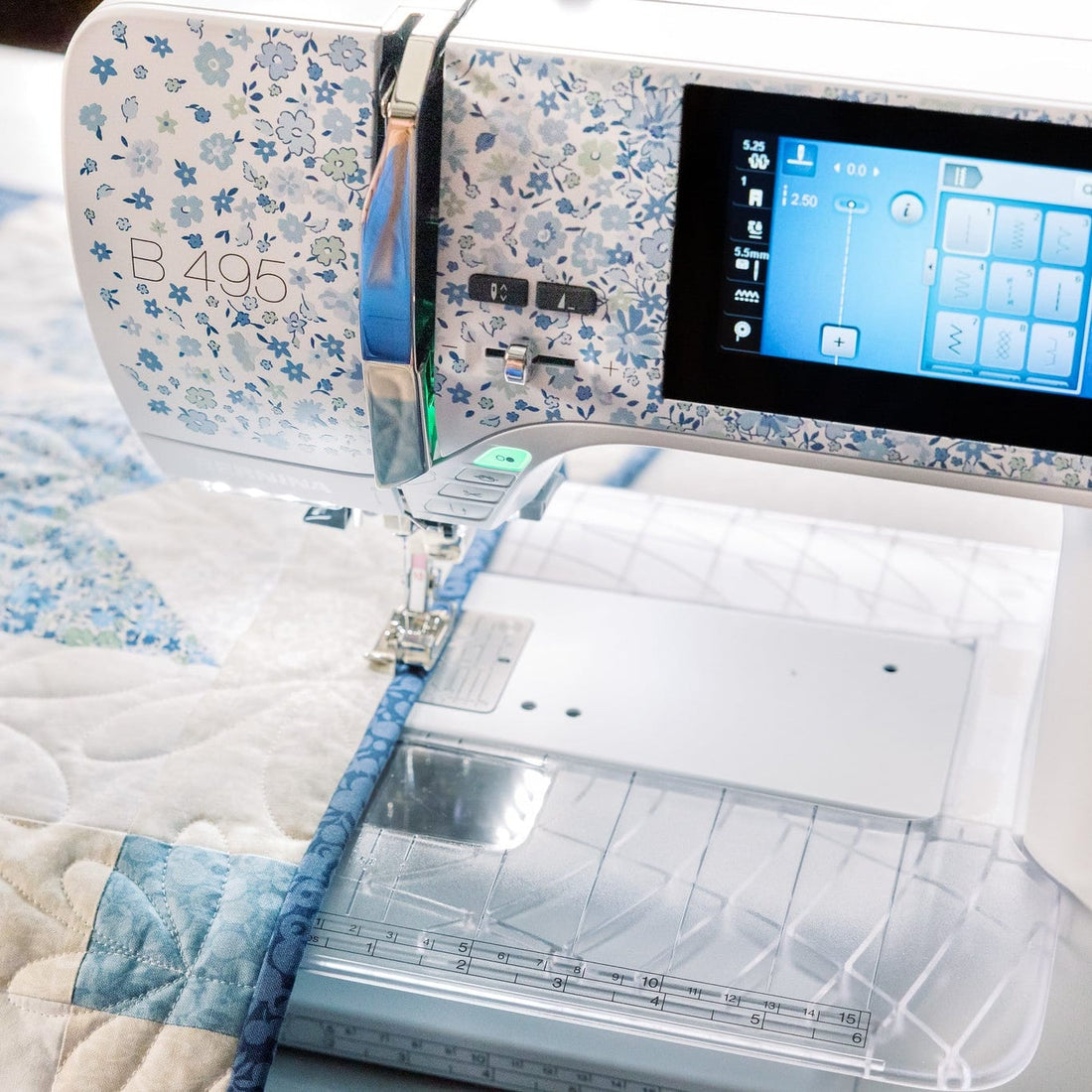 Sewing machine on a quilt with a digital display