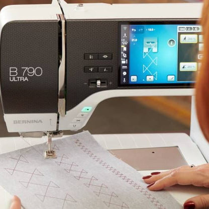 Person using a Bernina B.790 Ultra sewing machine with a digital display.