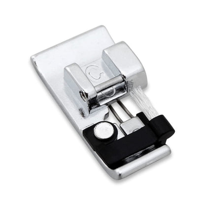 Metal sewing machine presser foot on a white background