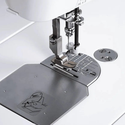 Sewing machine attachment on a white background