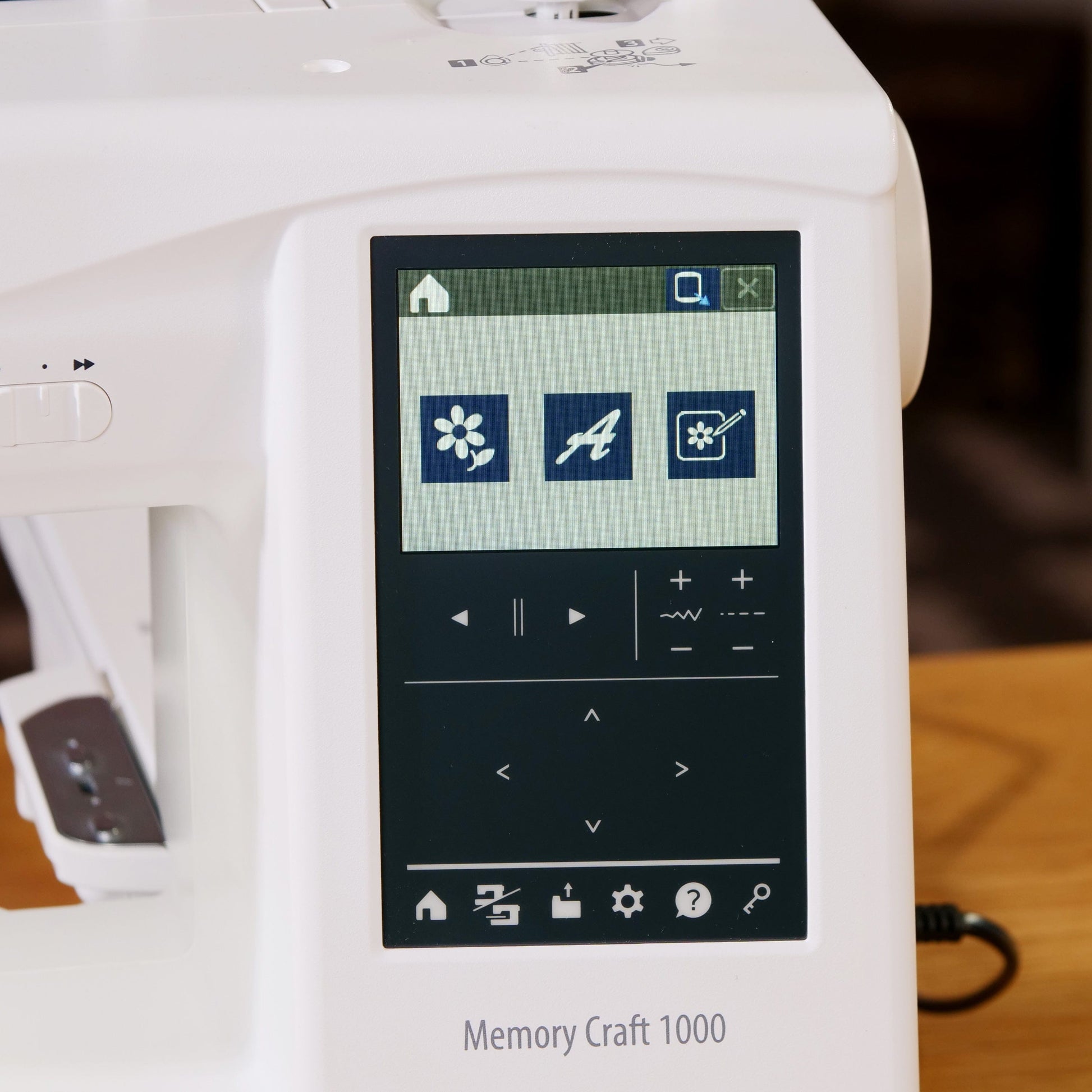 Janome Sewing Machines Janome Memory Craft 1000 Sewing and Embroidery Machine  - The Sewing Studio