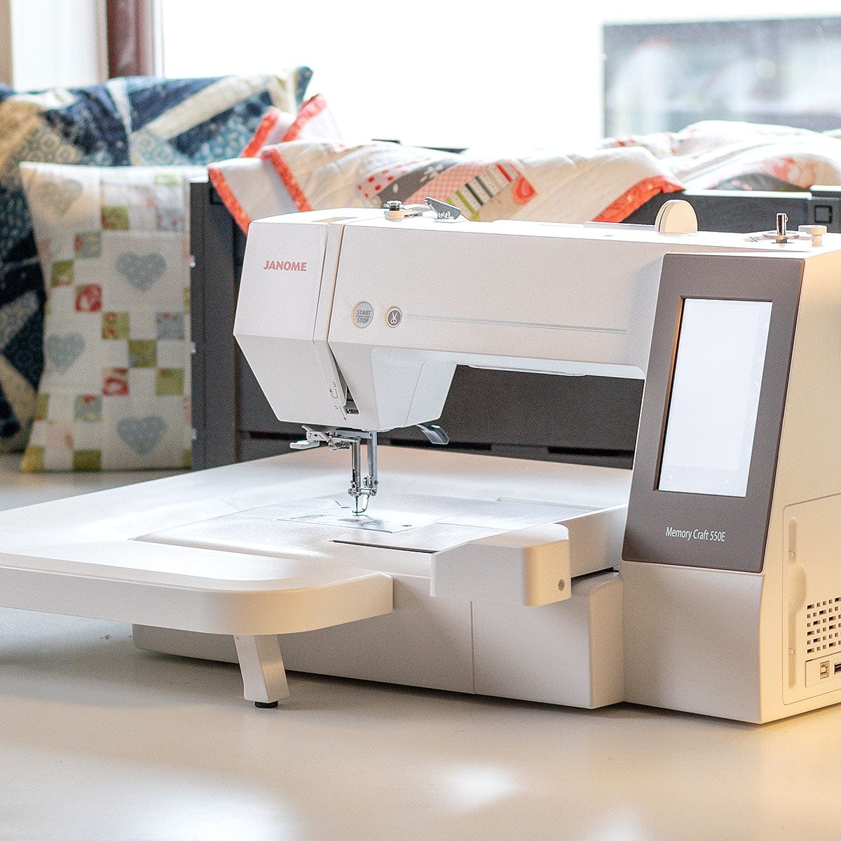Janome Memory Craft 550E with table