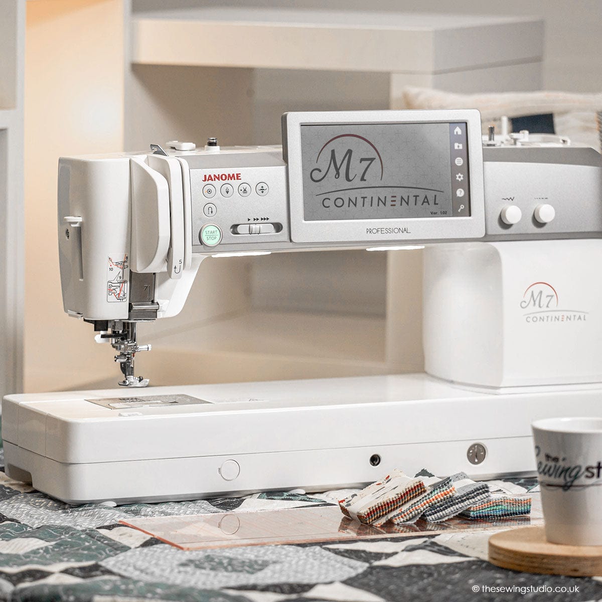 Janome M7 Continental Sewing Machine Grey Background Lifestyle Photo