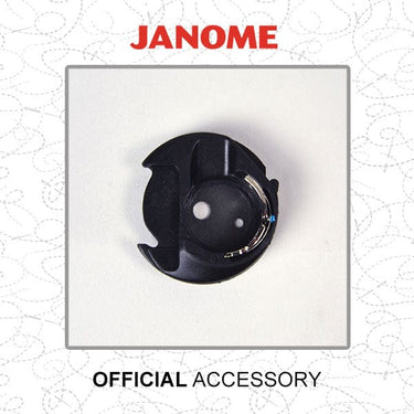 Janome Sewing Machine Accessories Janome Freemotion Quilting Bobbin Case (Blue Dot). For Top Loading Machines With Auto Thread Cutter Function. 200445007  - The Sewing Studio for sale UK - The Sewing Studio