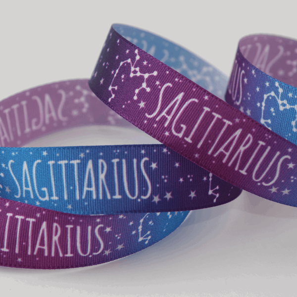 Zodiac Star Sign Ribbon: Sagittarius: 15mm wide. Price per metre.
